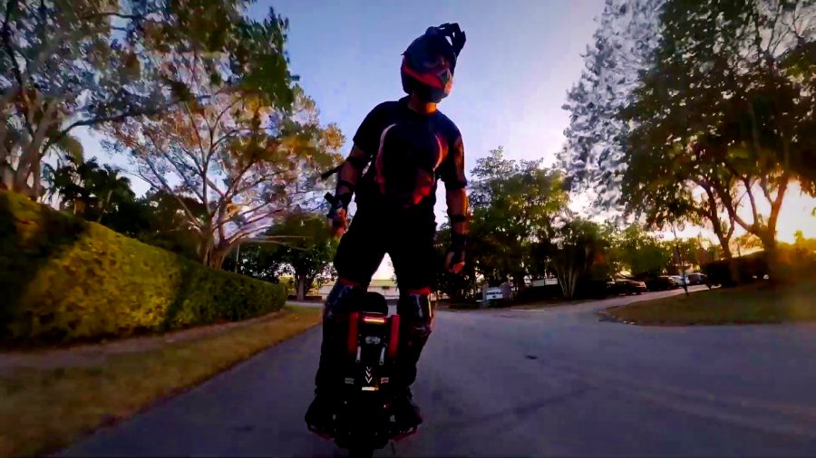 A rider on the Iron Lynx build at golden hour.